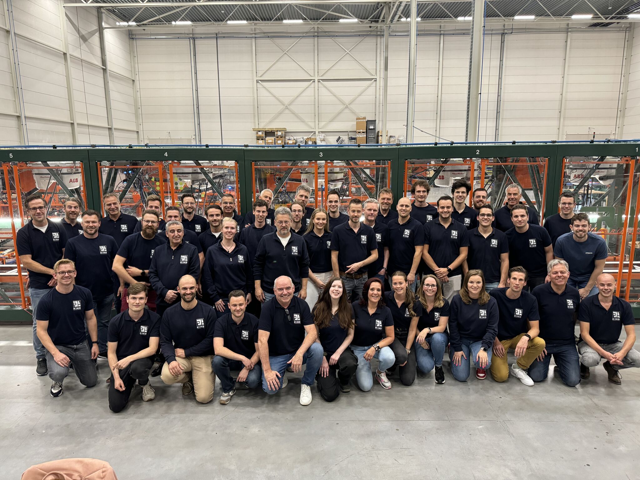 All colleagues of Crux Agribotics on a groupsphoto at the Familyday